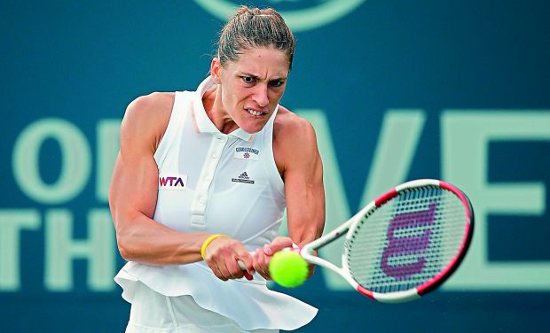 Andrea Petkovic of Germany returns a shot to Ajla Tomljanovic of Crotia during the first day of the Bank of the West Classic at the Taube Family Tennis Stadium in Stanford, California.(Photo: AFP) Andrea Petkovic of Germany returns a shot to Ajla Tomljanovic of Crotia during the first day of the Bank of the West Classic at the Taube Family Tennis Stadium in Stanford, California.(Photo: AFP)